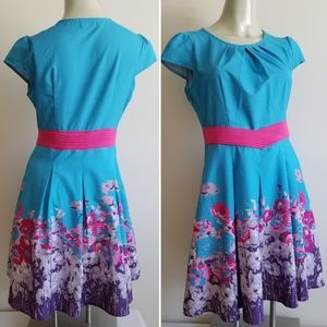 Vibrant contrast retro feel dress Great print!!